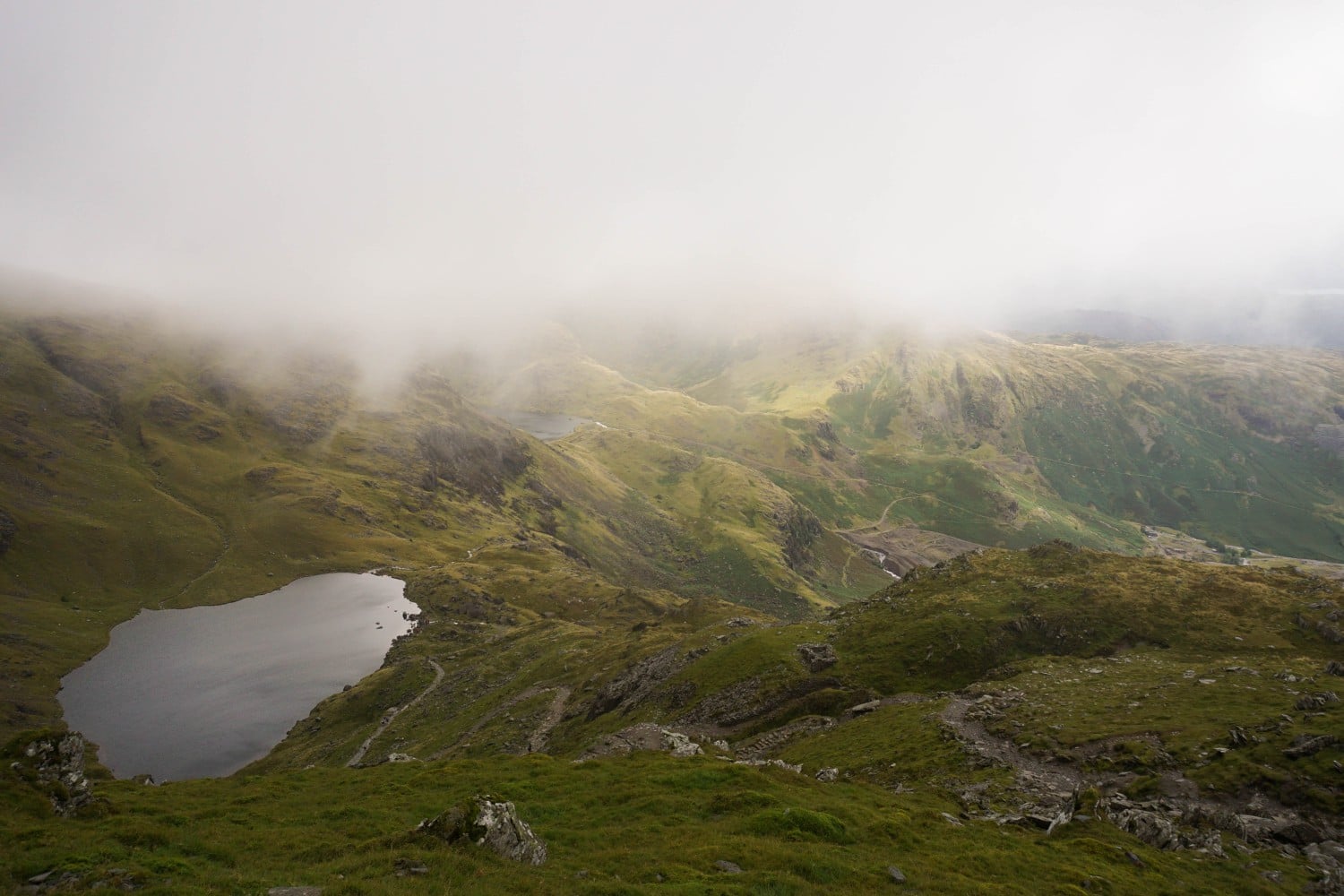 Lake District - Old Man of Coniston. Looking out over Low Water. Read our full guide to hiking in the Lake District.